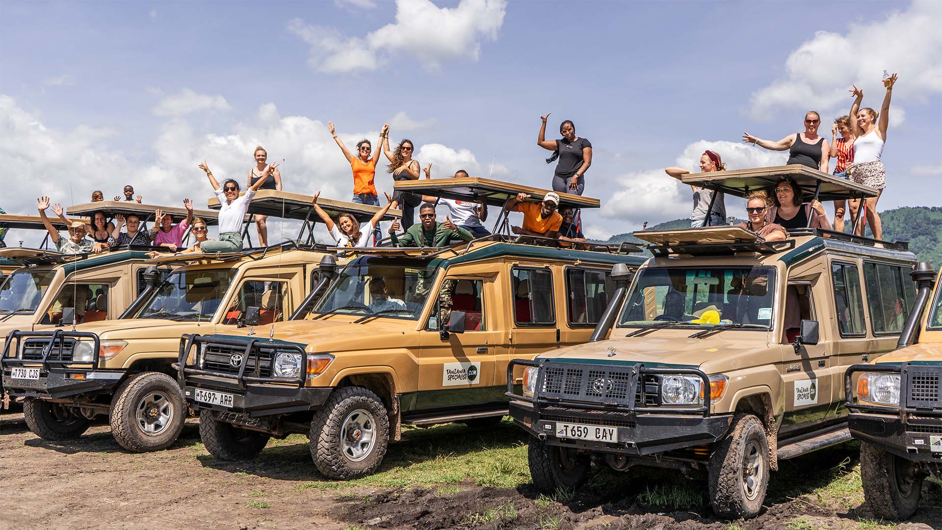 team Tanzania experts with the jeeps